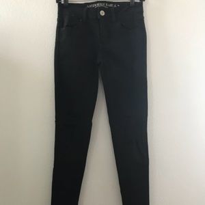 Black ripped skinny jeans